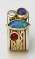 A commissioned Stacking Ring for Andy, with Opal and mixed stones '